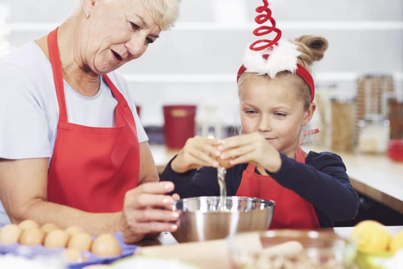 Grooms Her Grandchildren